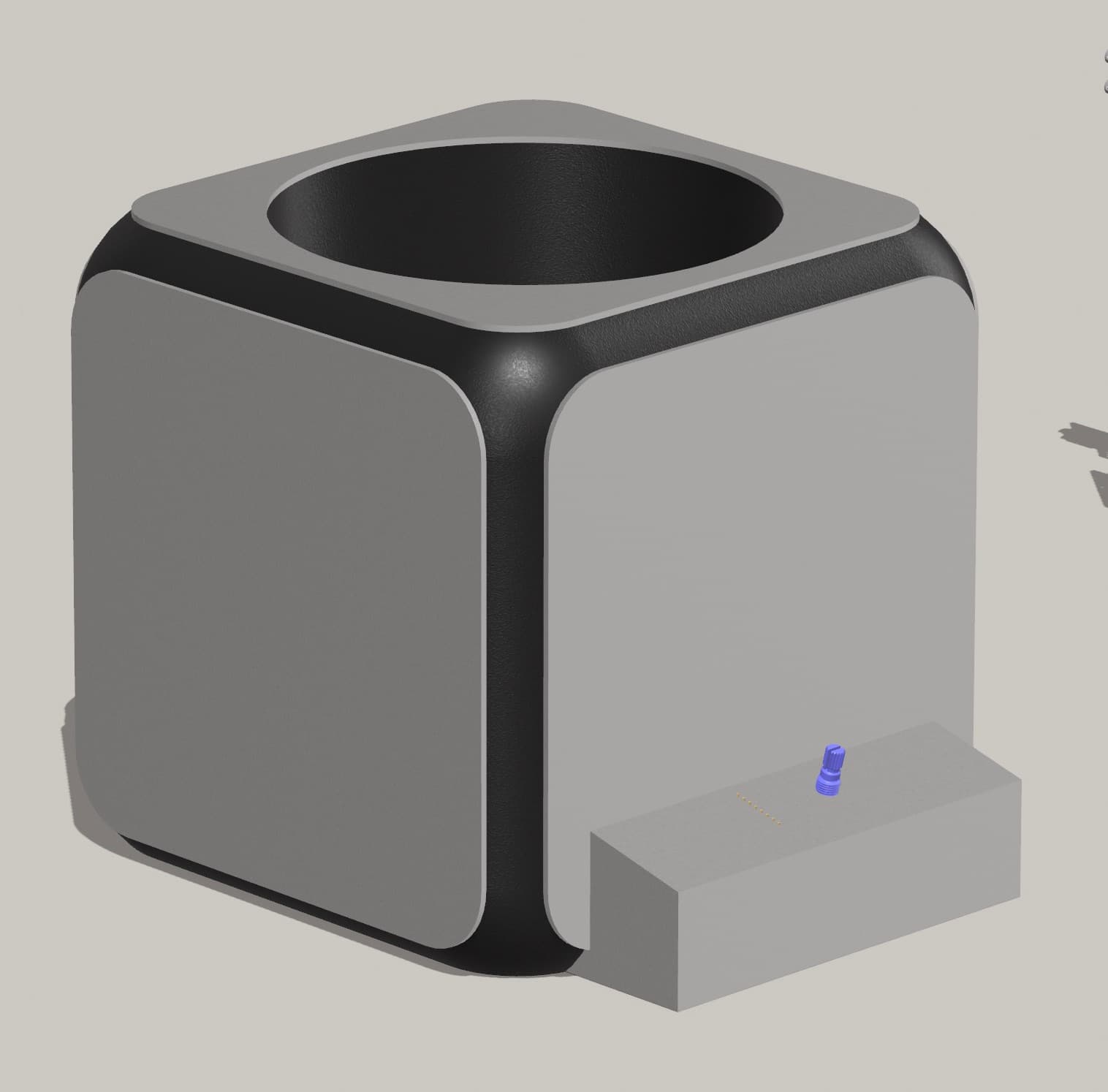 Render CAD bryły obudowy KNOBY: kostka z okrągłym otworem na górze i detalem montażowym z boku.